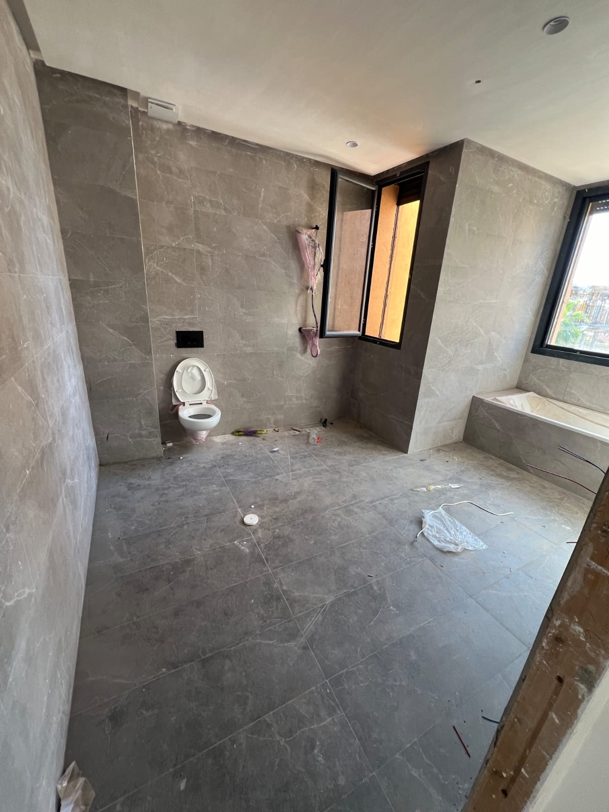 Travaux de finition villa à Myskz